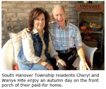 South Hanover Township residents Cheryl and Wayne Hite enjoy an autumn day on the front porch of their paid-for home.